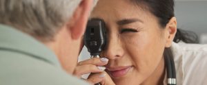 man getting eye exam for eye floaters