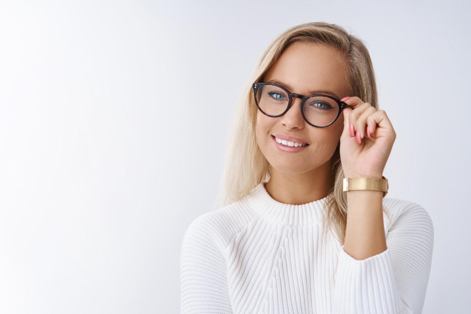 Customer wearing new Hakim Optical eyeglasses